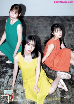 A group of young women standing next to each other.