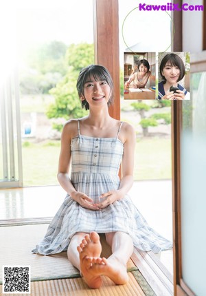 A woman in a sailor outfit on the cover of a magazine.