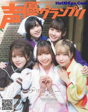 A group of young women dressed in costumes posing for a picture.